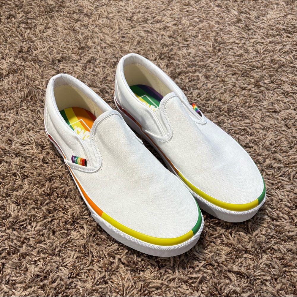 Vans White Slip-On Sneakers with Rainbow Accents